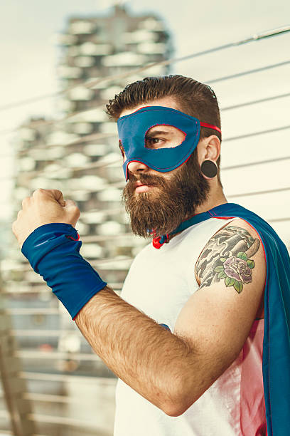 istock Hipster superhero showing fist 466476062