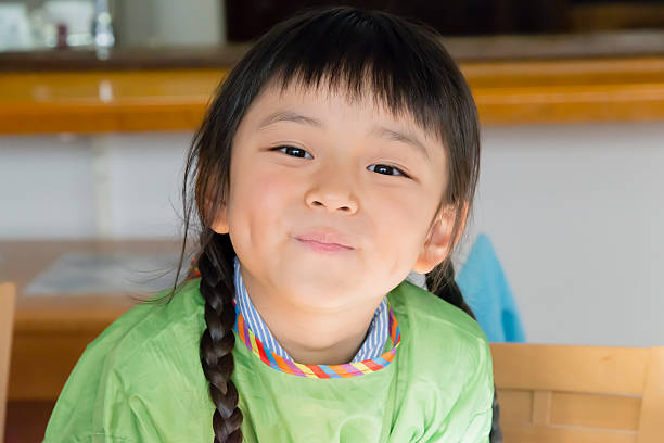 istock Little girl looking at camera 466481487