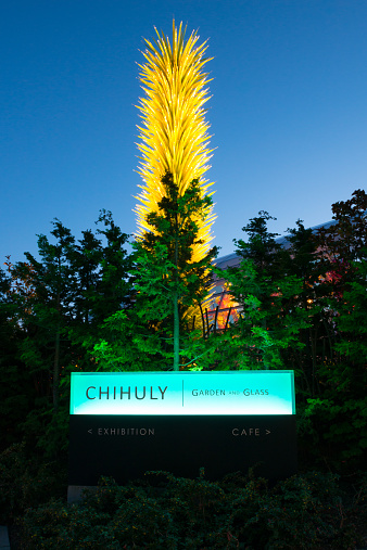 Seattle, USA - March 2, 2015: The Dale Chihuly Garden of Glass at twilight in the Seattle Center by the Space Needle. 