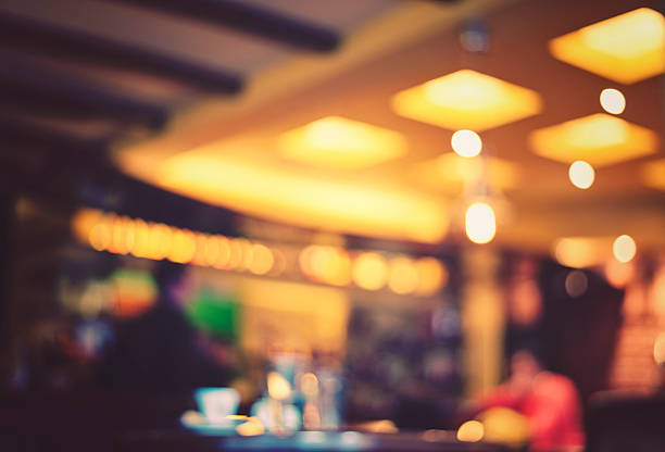 istock Blurred image of cafe with yellow lights 466485214