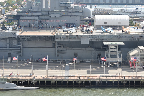 New York, NY - September 8, 2013: Intrepid museum in New York City. USS Intrepid is one of 24 Essex-class aircraft carriers built during WWII for the US Navy.