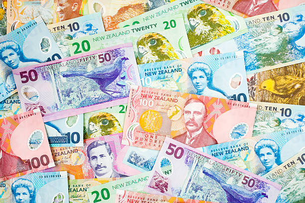 New Zealand Currency Background Background of New Zealand Currency. new zealand dollar photos stock pictures, royalty-free photos & images