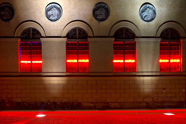 istock Illuminated historic windows in Munich, Germany, at night 466486165