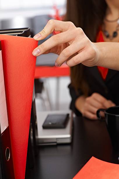 istock Close-up photo of hand picking folder 466486403