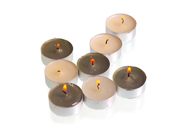 istock burning candles form a arrow on  white background 466486707