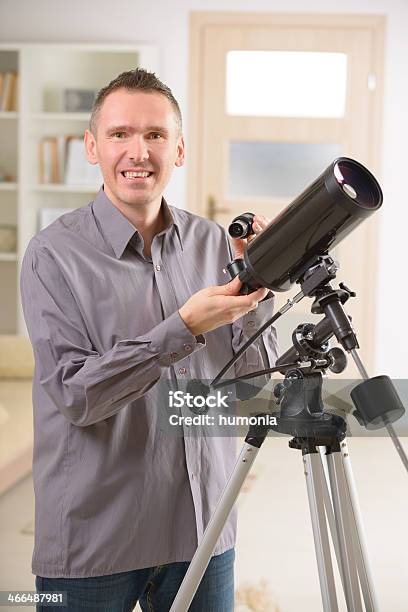 Man With Telescope Stock Photo - Download Image Now - Addiction, Adult, Adults Only