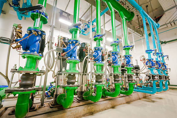 istock Water pumping station and industrial interior pipes 466488360