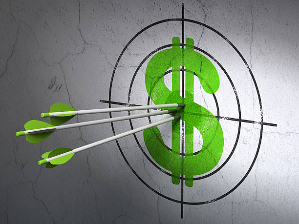 Currency concept of arrows I. A dollar target on a gray wall Success currency concept: arrows hitting the center of Green Dollar target on wall background, 3d render super money stock pictures, royalty-free photos & images