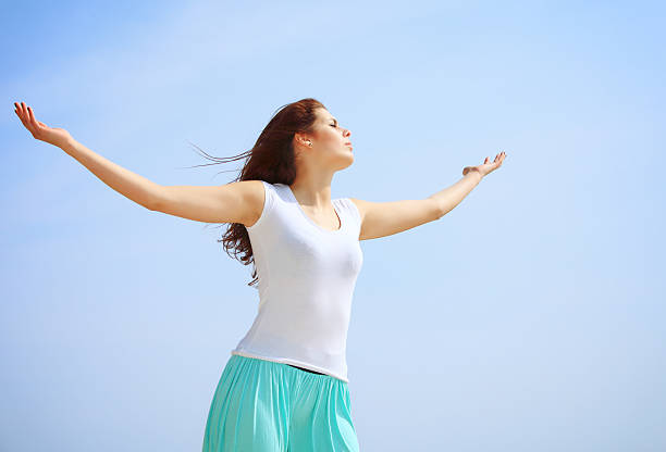 istock Summer girl with raised hands. Freedom. 466489623