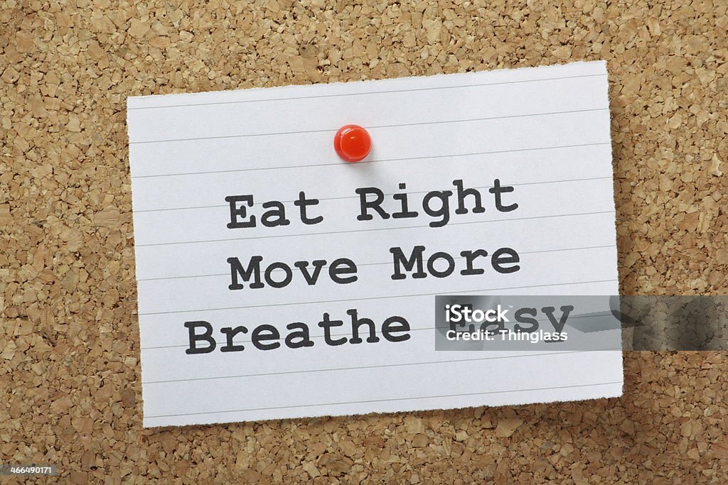 Eat Right,Move More and Breathe Easy The phrase Eat Right,Move More and Breathe Easy on a note pinned to a cork notice board as a motivational call to exercise and adopt a healthy lifestyle. Activity Stock Photo
