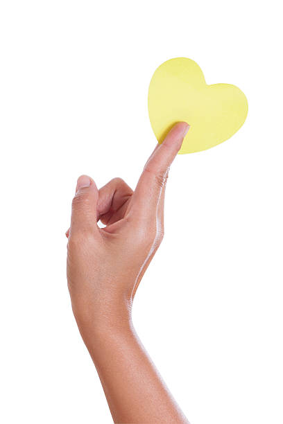 istock hand holding paper heart, 466491339