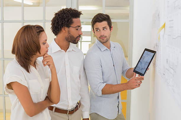 istock Business people using digital tablet in meeting 466496476