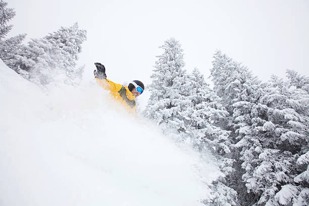 istock Freeride snowboarder on ski slope 466496882
