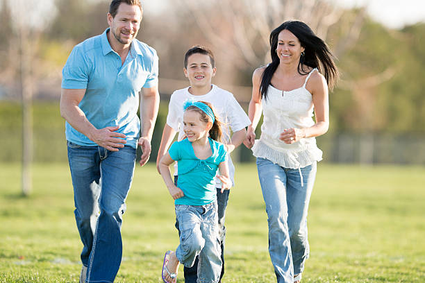 istock Young Family at the Park 466497540