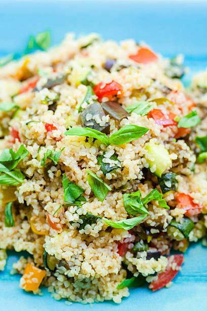 istock Bulgur Salad With Zucchini, tomatoes and Fresh Basil 466499129