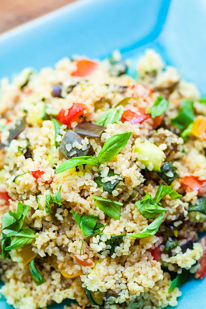 istock Bulgur Salad With Zucchini, tomatoes and Fresh Basil 466499291