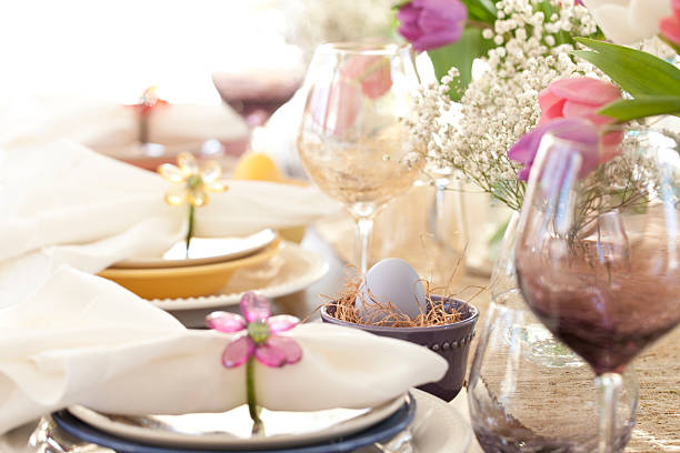 istock Easter dining table, bouquet of tulips and lovely place setting 466500270