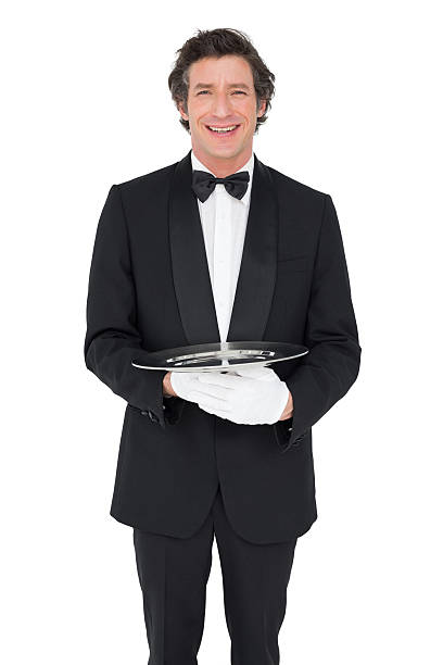 istock Happy waiter holding empty tray over white background 466501232