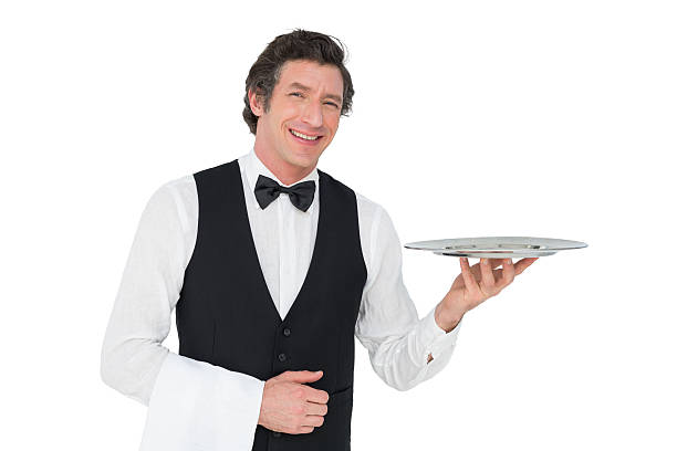 istock Happy waiter holding tray against white background 466501256