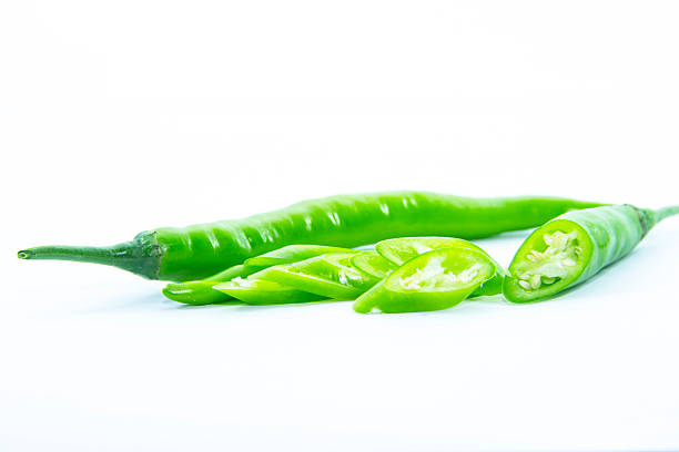 istock Pieces of green chili pepper with raw material 466501580