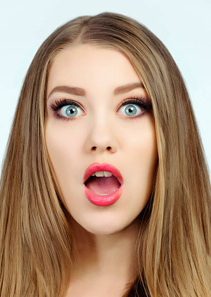 istock beautiful amazed woman portrait 466502327