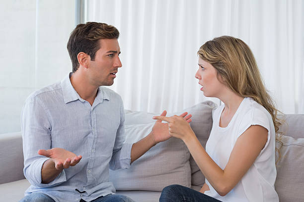 istock Couple having an argument in living room 466502730