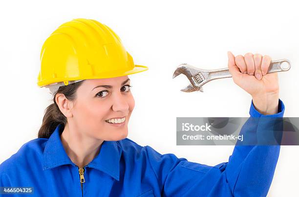 Woman Holding Adjustable Wrench Stock Photo - Download Image Now - Adjustable, Adjustable Wrench, Adult