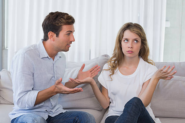istock Couple having an argument in living room 466504828