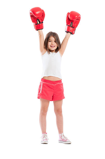 Young boxer girl champion stock photo