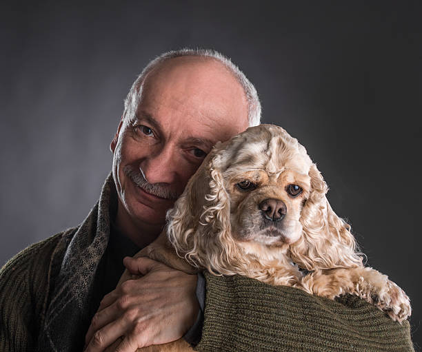 istock Happy old man with a dog 466509402