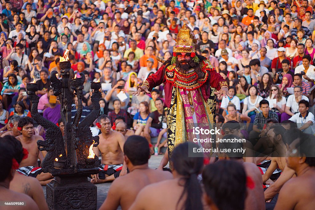 Kecak Dance Bali, Indonesia - Dec 22, 2014: Kecak - a traditional Balinese dance performed at Uluwatu Temple during sunset, by the "Karang Boma" dance studio. 2015 Stock Photo