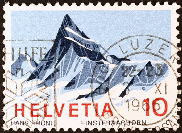 Swiss mountain on a cancelled stamp