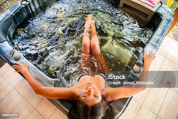 Woman Enjoying Hot Tub Stock Photo - Download Image Now - Hot Tub, Bathtub, Heat - Temperature