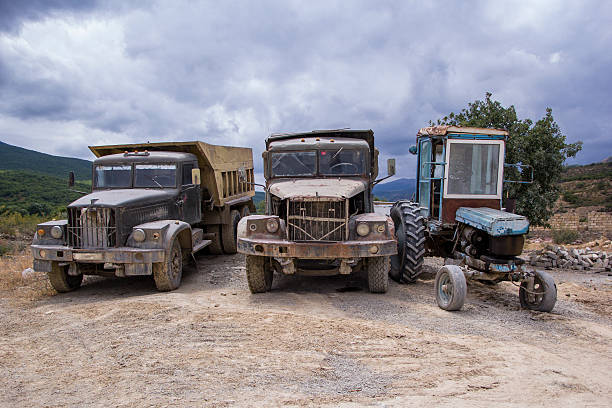istock Old abandoned trucks in the quarry 466523882