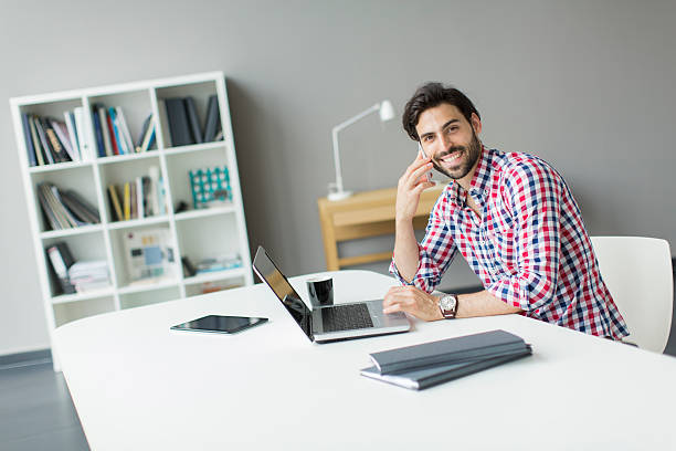 istock Young man in the office 466524394