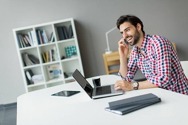 istock Young man in the office 466524474