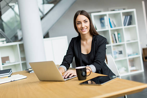 istock Young woman in the office 466527286