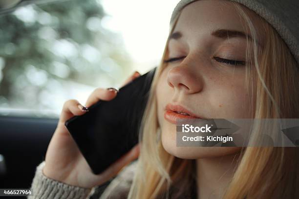 Beautiful Young Blond Teen In The Car Stock Photo - Download Image Now - 2015, Blond Hair, Eyes Closed