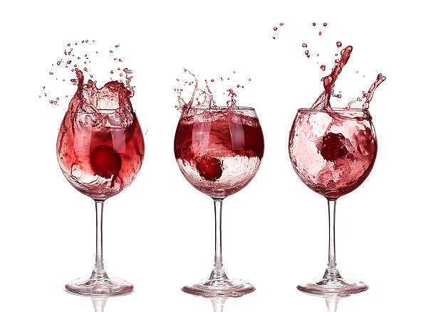 istock glass of red wine grapefruit isolated on a white background 466531678