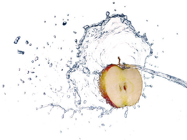 istock Apple in spray of water. Juicy apple with splash 466532904