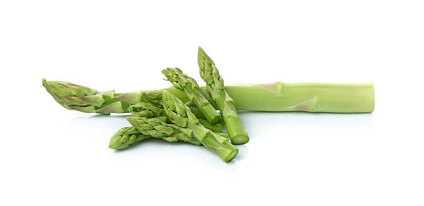 istock Bunch of fresh asparagus isolated on white 466532930