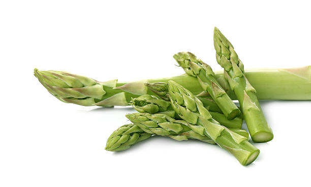 istock Bunch of fresh asparagus isolated on white 466532932