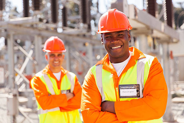 istock young african american electrical engineer in substation 466535586