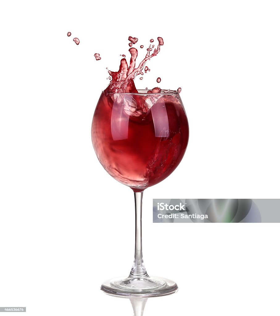 Wine collection - Splashing red wine in a glass. Isolated Wine collection - Splashing red wine in a glass. Isolated on white background 2015 Stock Photo