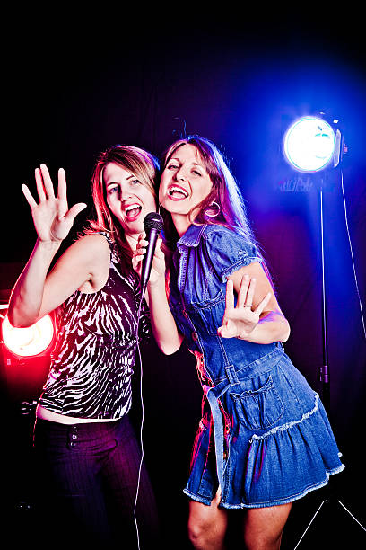 istock Women Singing Karoke 466539407