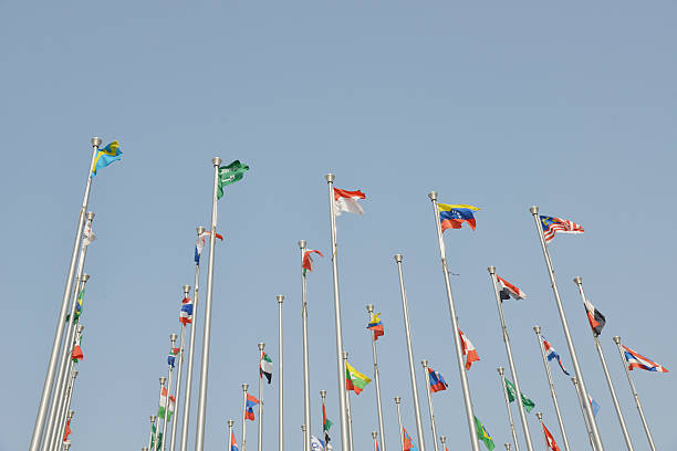 istock Rows of national flags  fltutter on poles 466540189