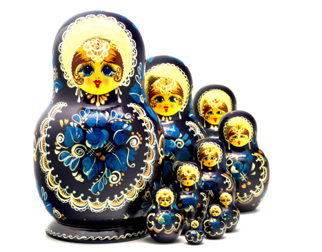 Russian nested dolls, also known like matryoshka on white background. Studio shot.