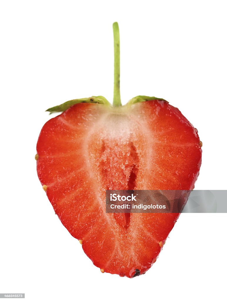 Close up half of strawberry. Close up half of strawberry. Isolated on a white background. Chopped Food Stock Photo