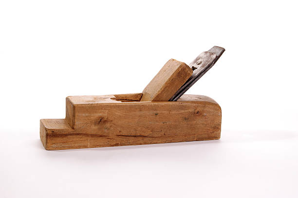 istock Old wooden planer close-up, white background 466546105