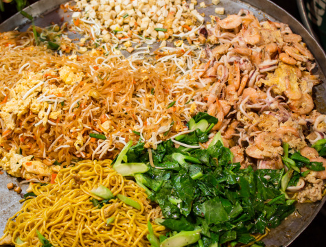 fried noodle with vegetables in Thai market